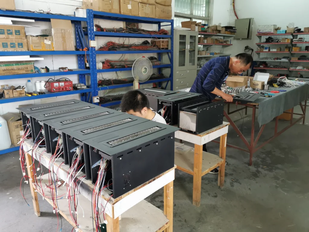 SXFireplace technicians assembling ethanol burner units