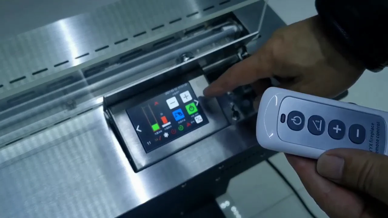 Historical KT operation-video frame with a handheld remote and touchscreen